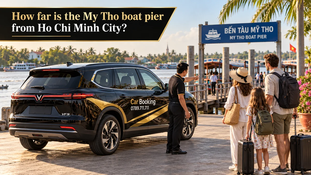 Driver points travelers toward the My Tho riverboat pier beside a branded SUV
